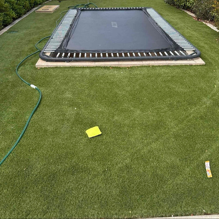 Turf grass holds onto debris, Pure Desert professionally removes deep embedded debris.