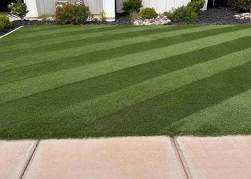 Golf course style stripes in the front yard of a home in Washington, UT
